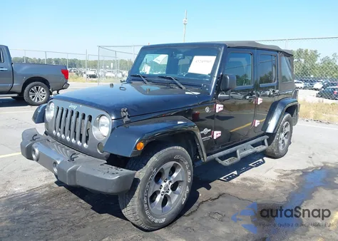 2015 Jeep Wrangler Unlimited Freedom Edition from USA, damaged, VIN 1C4BJWDG8FL573414